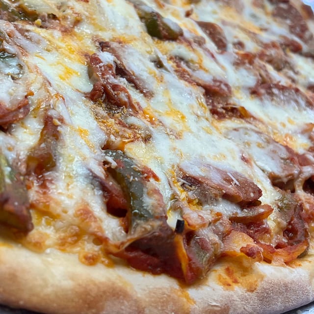 Sausage, Peppers & Onions Pizza.
